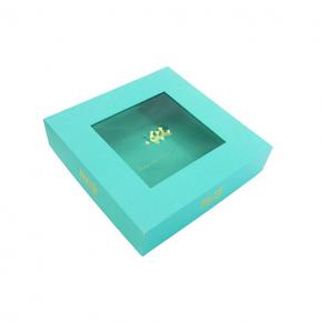 Teal paper box with clear window